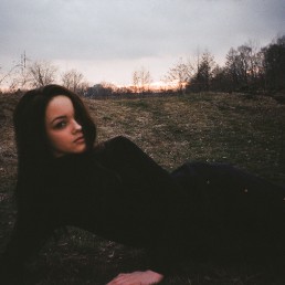 Ukrainian girl laying in the nature